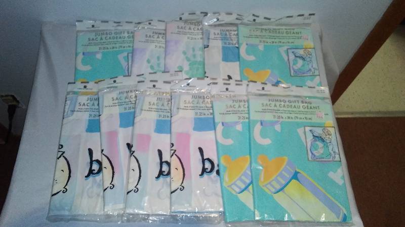 lot 10 image: Gift Bags (11) 31 x 30 Misc. Patterns