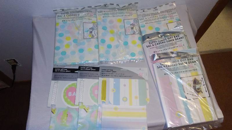 lot 11 image: Gift Bags 40 x17 (5), 36 x44 (3) Misc. Patterns