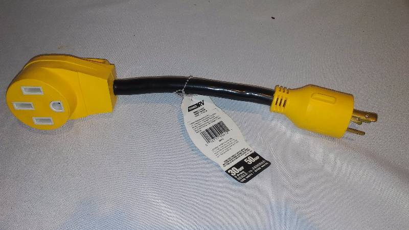 lot 19 image: Trailer Converter CamCo RV, 30 Amp, 50 Amp 3 Prong male to female