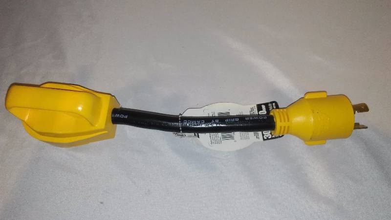 lot 18 image: Trailer Converter CamCo RV, 30 Amp, 50 Amp 3 Prong male to female