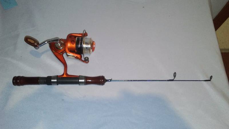 lot 30 image: ProTouch Fishing Rod and Reel by Shakespeare, 19 Inches long