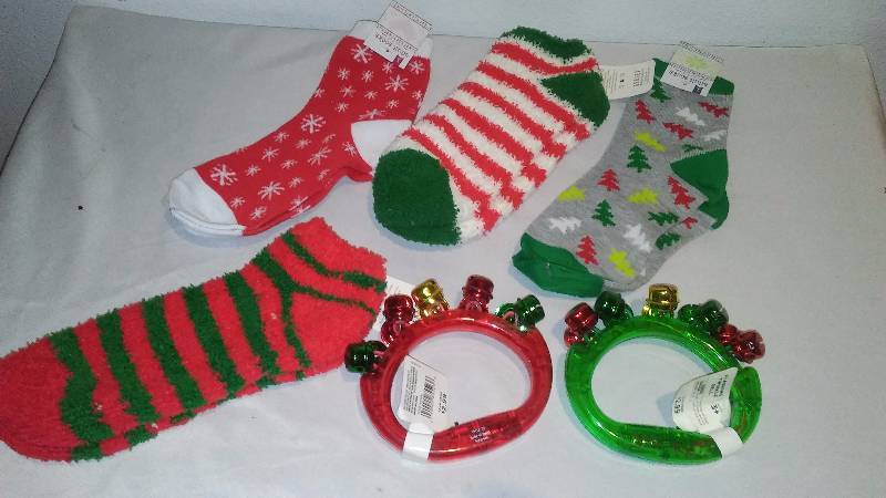 lot 51 image: Holiday Socks (4) and Handle Jingle Tambourine (2)