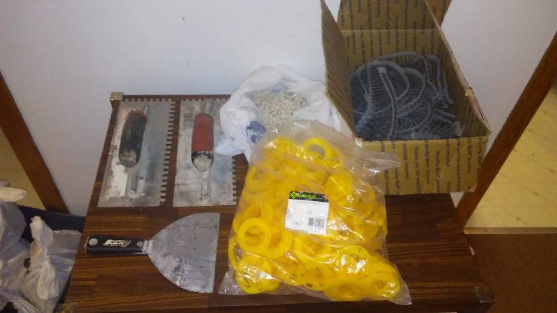 lot 139 image: Trowels, tile spaces, drywall nails and wire bushings