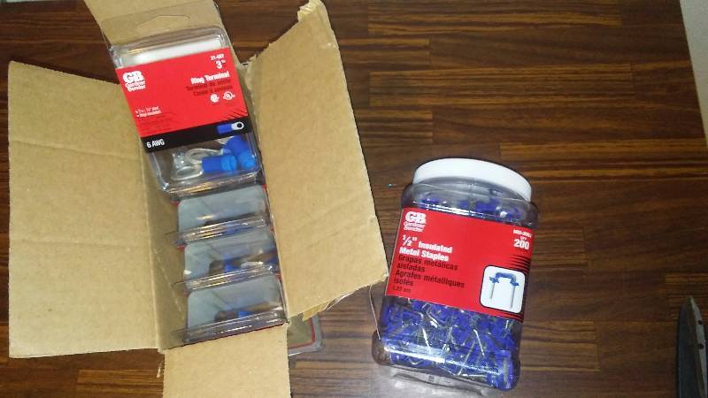 lot 204 image:  Inch Metal Insulated Staples (200 ct.) and Ring Terminals (5) 3 per package