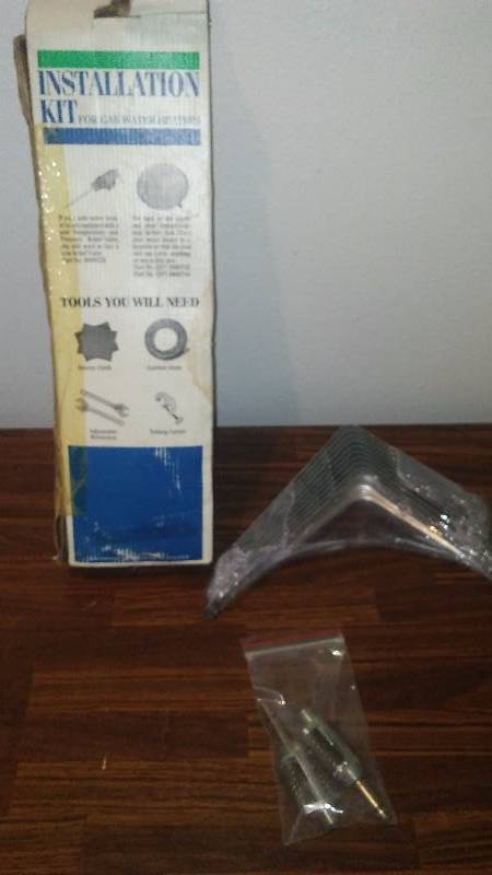lot 212 image: Angle Brackets (10) Gas Water Heater installation kit, pencil sharpener blade replacement