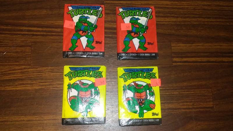 lot 220 image: T.M.N.T. Trading Cards (4) five cards in each wax pack