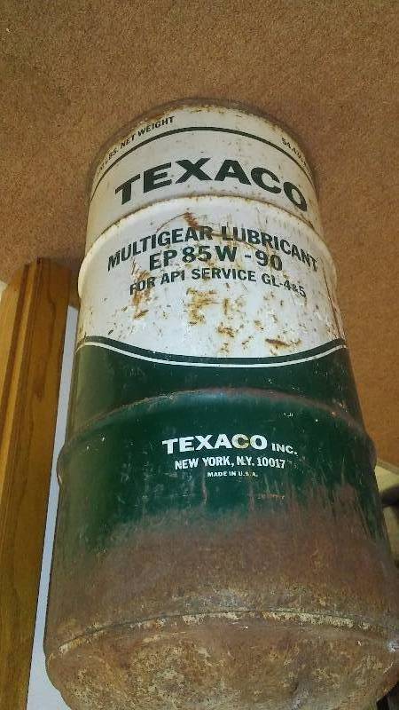 lot 221 image: Vintage Texaco Can, 120 lb. Net Weight, 29 inches tall and 15-inch diameter.