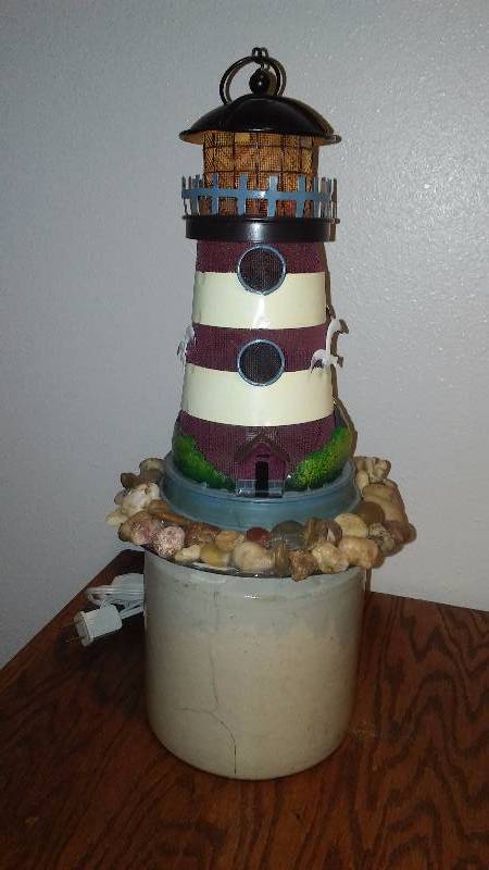 lot 229 image: Yard Garden Cabin Art, Lighted Light House, 17 inches H