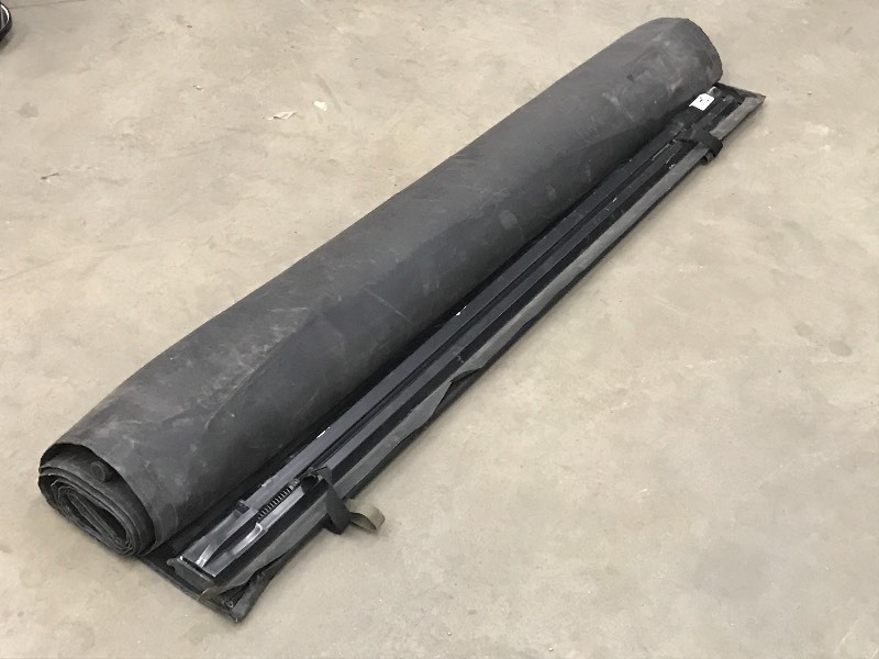 lot 34 image: Full-Sized Tonneau Cover Off A Ford...