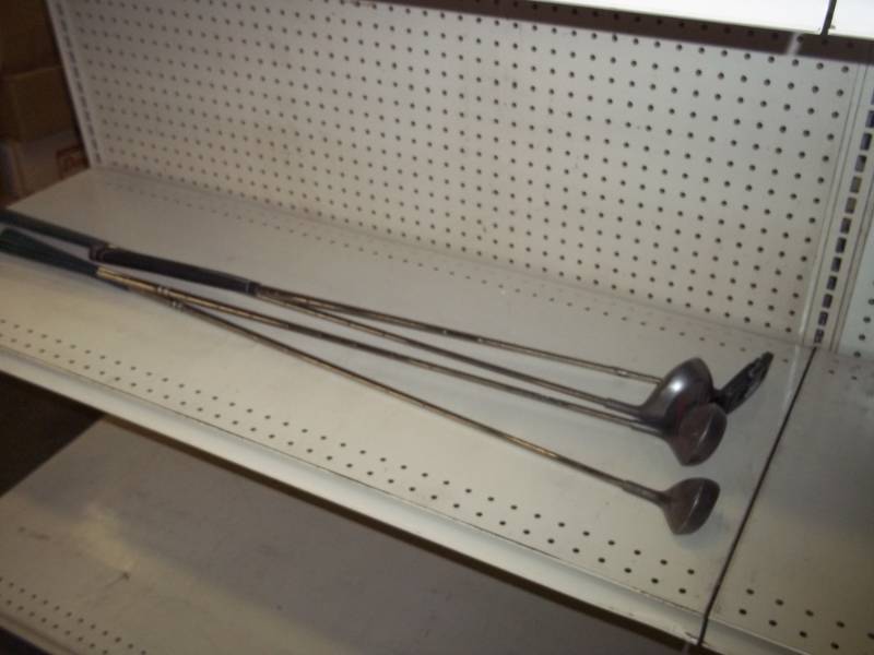 3 Golf Clubs and Putter