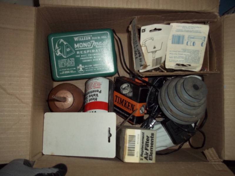 Assorted parts, pulley, oil can and ect..