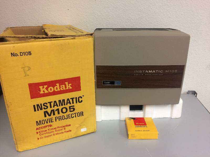 lot 11 image: Vintage Kodak Instamatic M105 Movie Projector