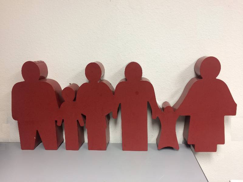 lot 22 image: Red Family Figure Wall Hanging