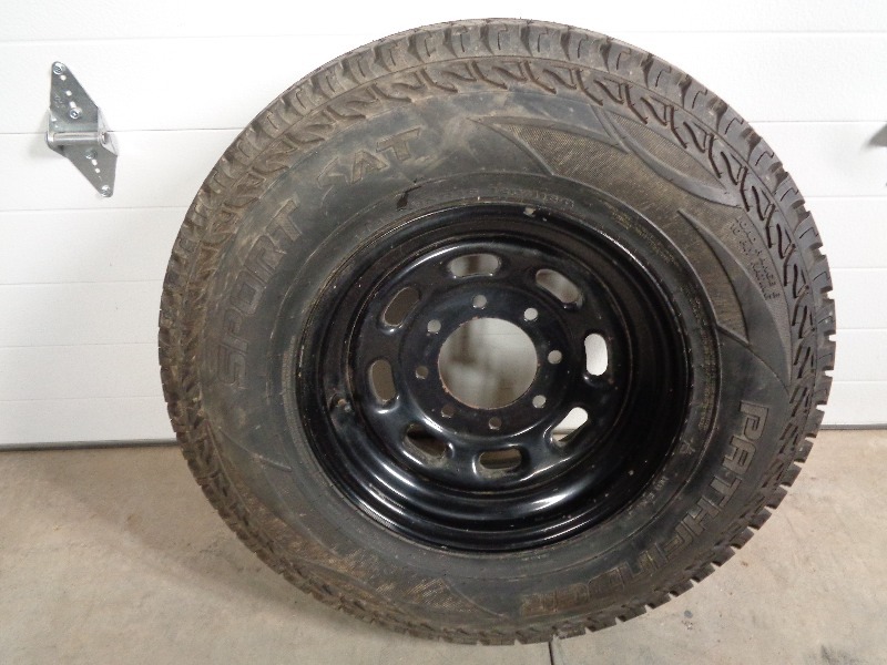 lot 14 image: Brand New LT23585-R16 Tire and Rim