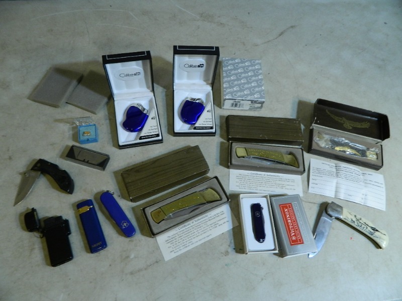 lot 25 image: New Electro Quartz Colibri Lighters, Knives, and More