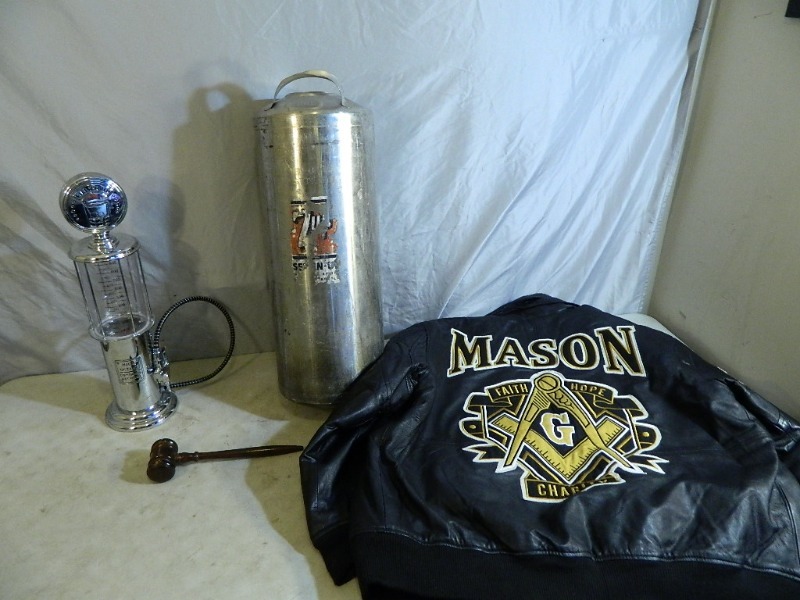 lot 29 image: Masons Leather Jacket, 7-Up Canister, Liqour Fuel Pump
