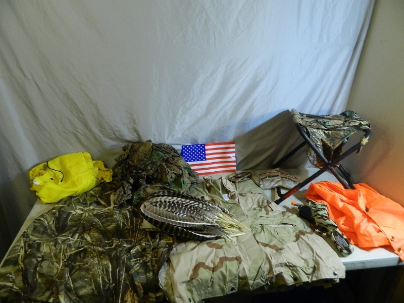 lot 50 image: Camo Clothes, Apron, Feathers, Rain Gear, Etc