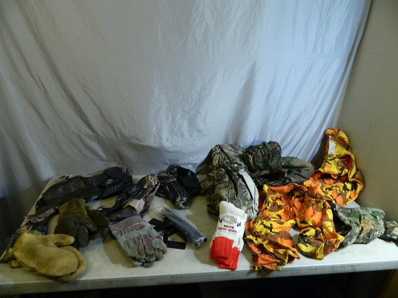 lot 54 image: Turkey Decoys, Rain Gear, Camo, Etc