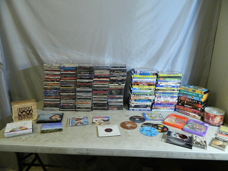 lot 149 image: Huge Lot of Cds, Dvds, VHS, and More