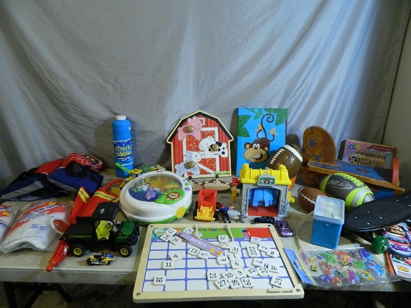 lot 193 image: Life Jacket, Skateboard, and Toys
