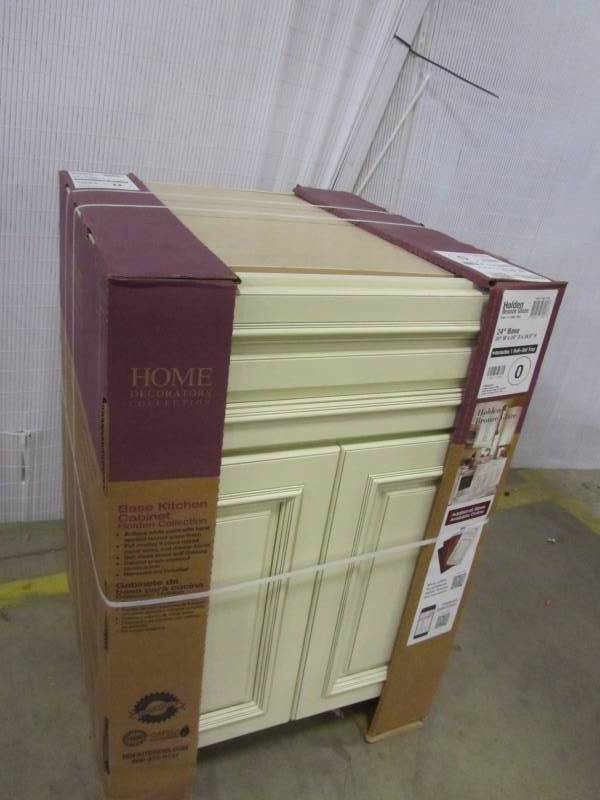 lot 49 image: Home Decorators Collection 24x34.5x24 in. Holden Base Cabinet with 2 Doors 1 Drawer and 1 Rollout Tray in Bronze Glaze