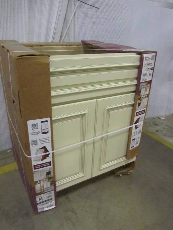 lot 50 image: Home Decorators Collection 30x34.5x24 in. Holden Sink Base with 2 Doors and a Drip Liner in Bronze Glaze