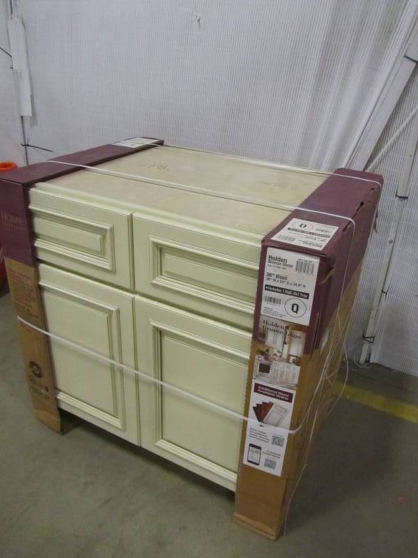 lot 51 image: Home Decorators Collection 36x34.5x24 in. Holden Base Cabinet with 2 Doors 2 Drawers and 1 Rollout Tray in Bronze Glaze