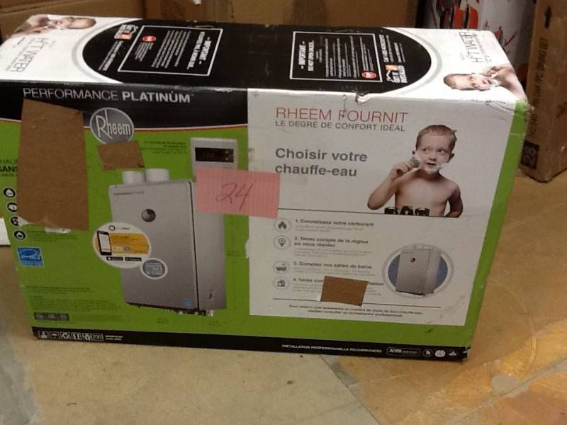 lot 24 image: Rheem Liquid Propane 9.0 GPM High EF Indoor Tankless Water Heater with Water Savings Setting  open box never used