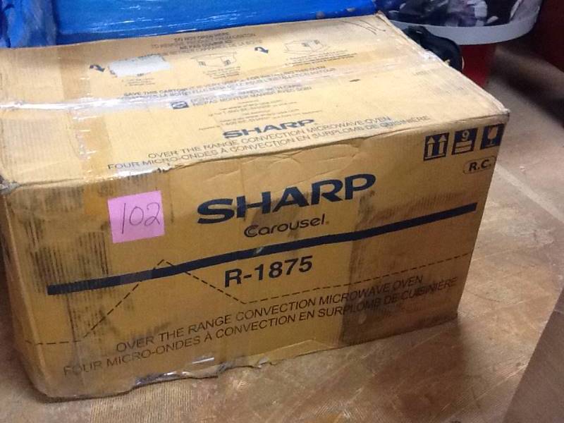 lot 102 image: Sharp R1875 Over the Range Convection Microwave Oven in like New working conditions