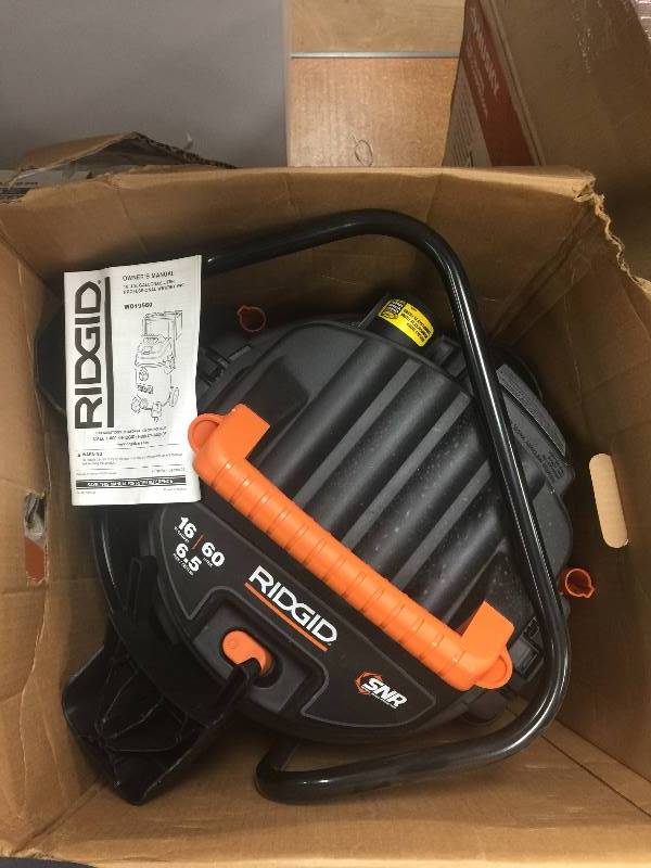 lot 112 image: RIDGID  16 gal. 6.5-Peak HP Stainless Steel Wet Dry Vac used in working conditions