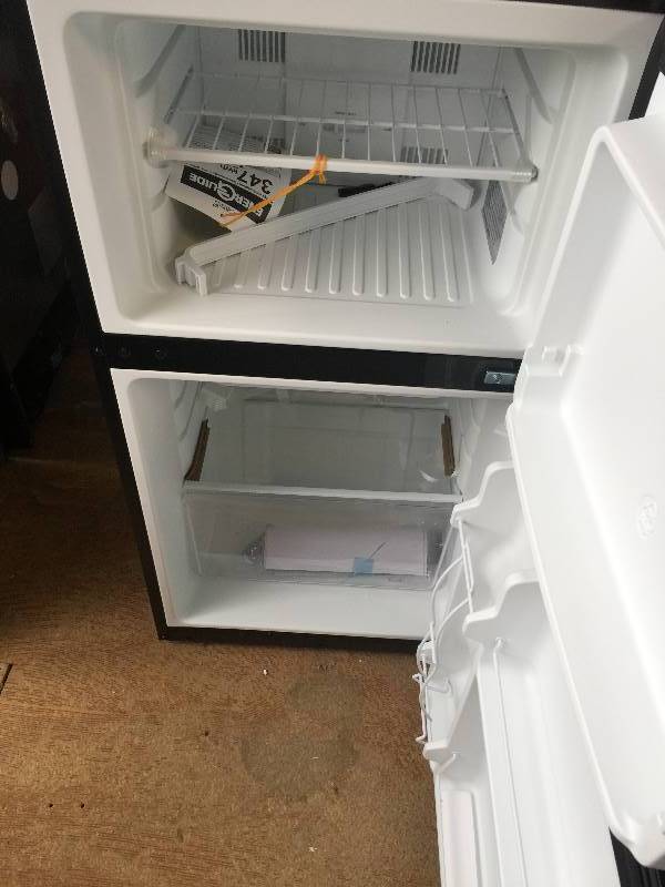 lot 300 image: Frigidaire 4.5 cu. ft. Mini Refrigerator in Silver Mist, Energy Star, Stainless Look in working conditions