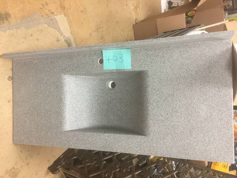lot 403-3 image: Swan Contour 49 in. Solid Surface Vanity Top in Gray Granite with Gray Granite Basin open box never used