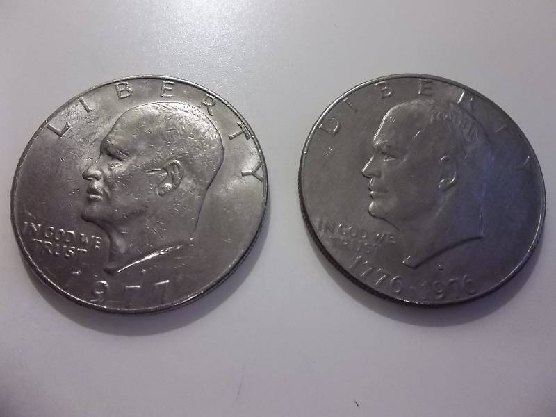 lot 69 image: 1977 & 1976 Ike Dollars
