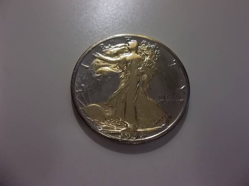 lot 72 image: 1934 Walking Liberty Half Dollar With Gold Plated Silhouette On Obverse & Complete Reverse