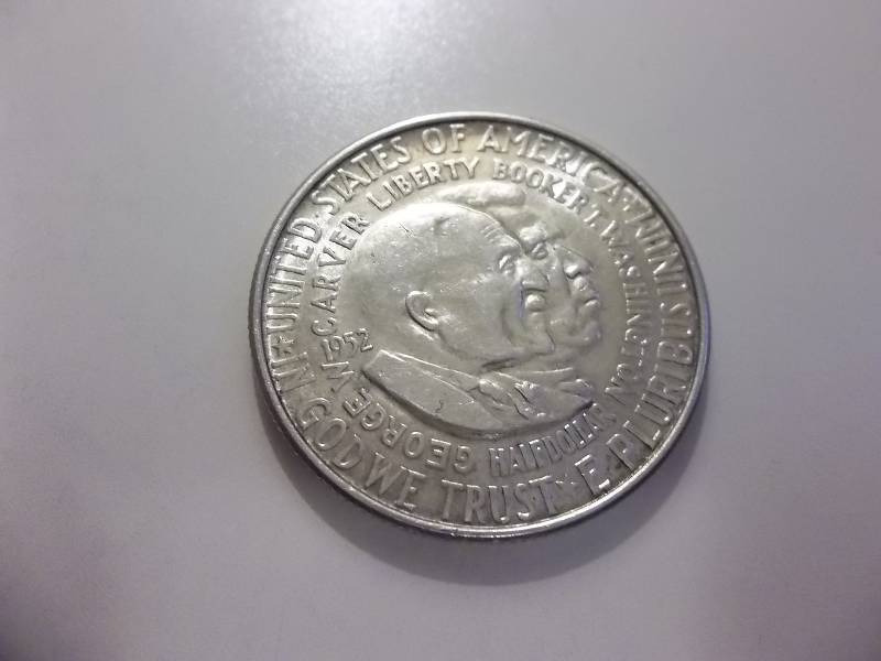 lot 76 image: Booker T. Washington & George W. Carver Comemmorative Half Dollar In MS