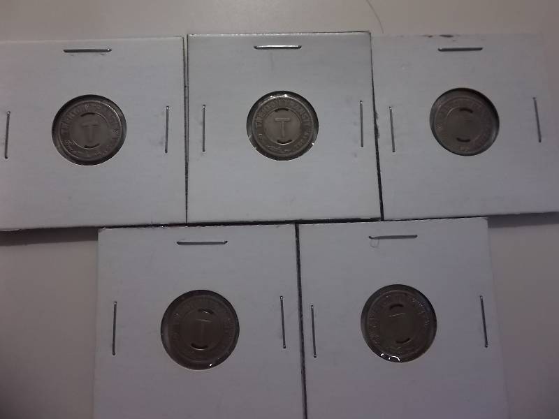lot 85 image: 5 Vintage Bus Tokens Stamped Trenton Transit Slabbed