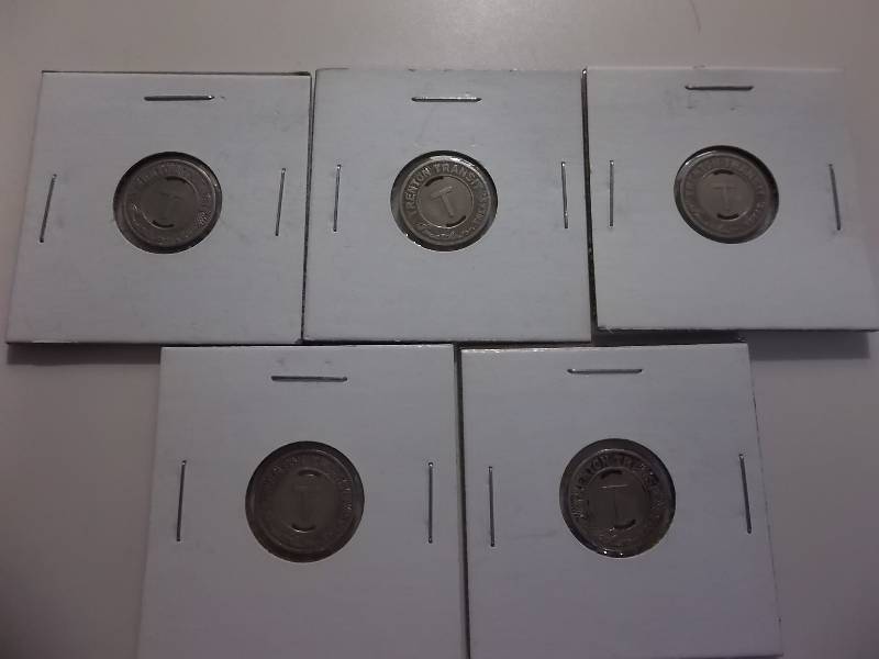 lot 86 image: 5 Vintage Bus Tokens Stamped Trenton Transit Slabbed