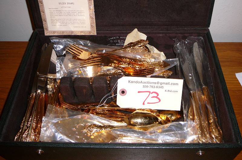 lot 73 image: Golden Brahms set of Silverware,