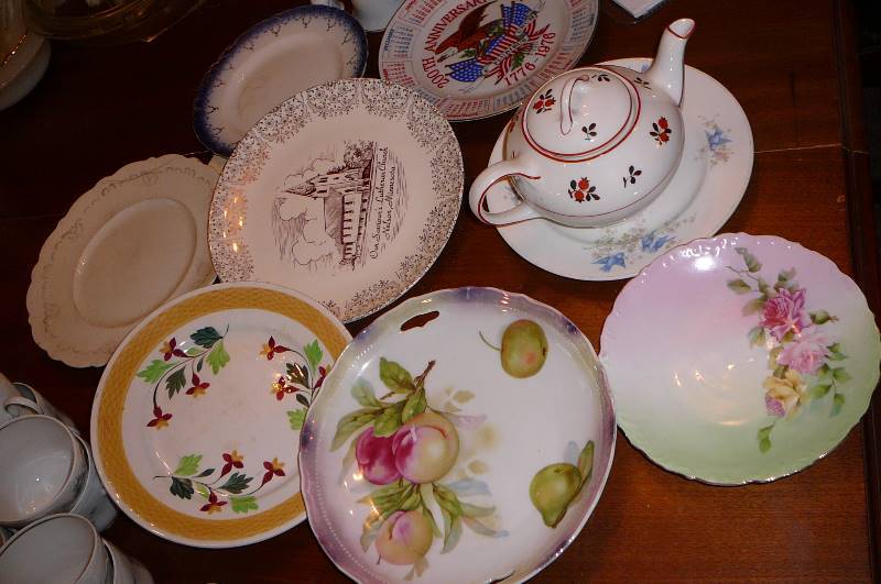 lot 88 image: Misc. Dishs with history on the back from nelson, 2 bells, Tea Pot and Sugar Pot