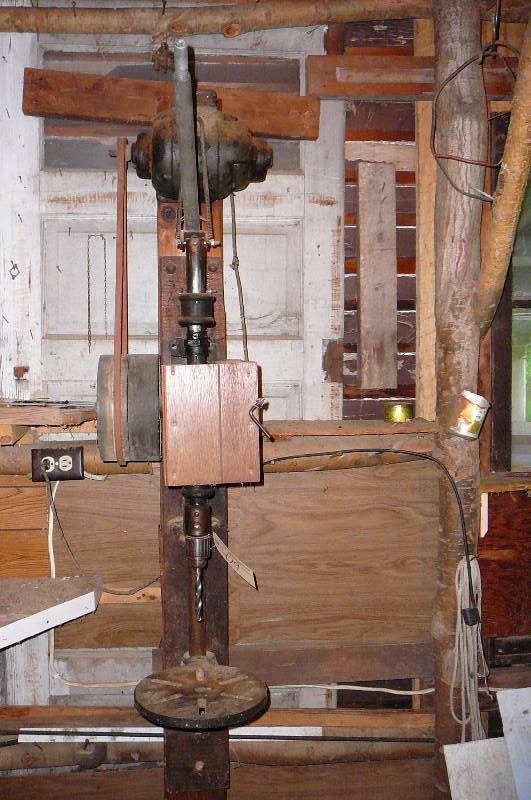 lot 479 image: vintage wall mount drill press  needs to be removed form wall 