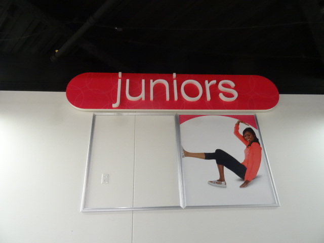 lot 77 image: Juniors Retail Sign Approx 10 X 24