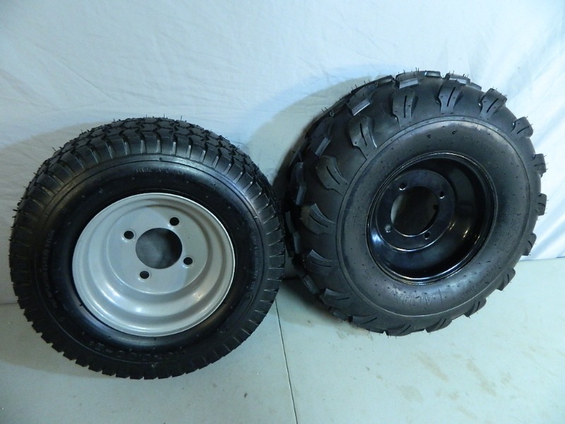 2 New Utility Tires with Wheels