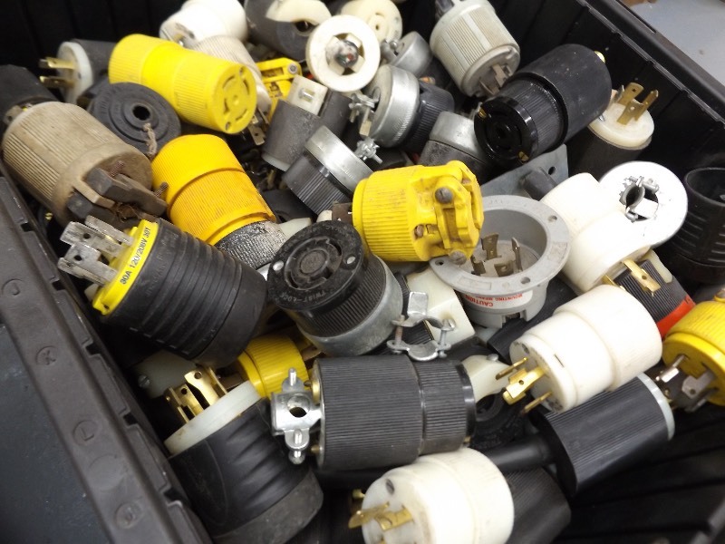 lot 19 image: 2 Large Bins Filled with Hundreds of MF High Voltage Plugs