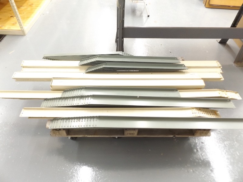 lot 31 image: Pallet of Surplus Teardrop Boltless 14ga Heavy Duty Steel Shelving Beams, etc.