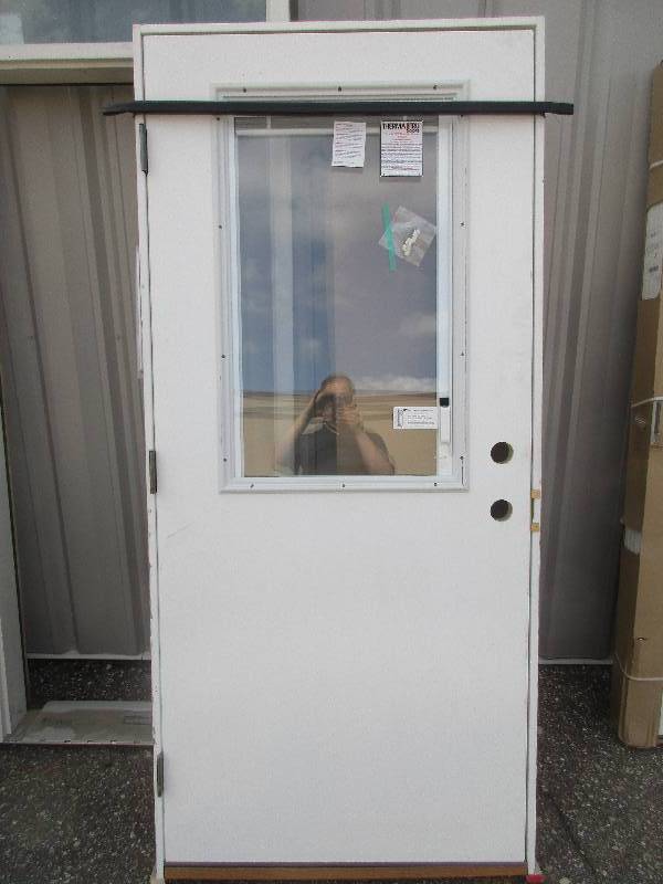 exterior door and frame 37.5 x 81.5 door has window w built in blind - Right swing