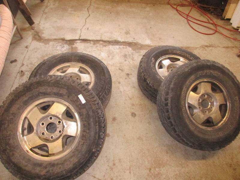 4 - 26575R16  tires w rims - mismatched tires all have good tread see pictures