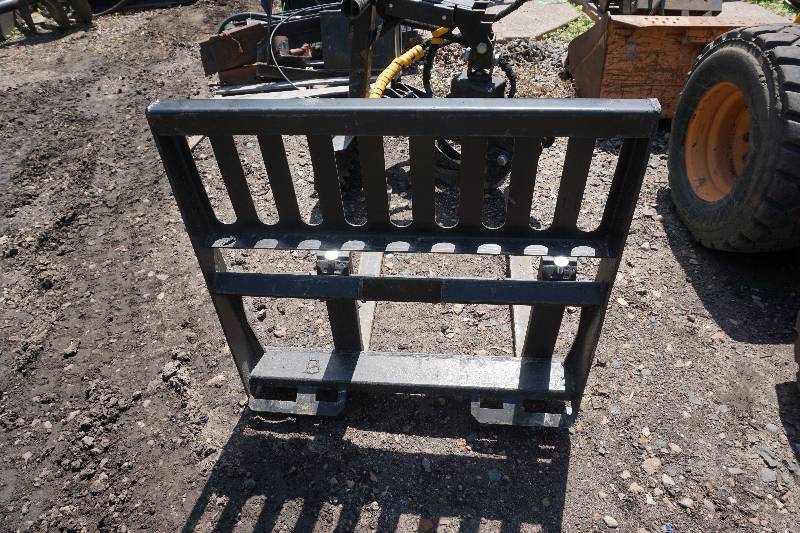 lot 35 image: Bobcat Mini MT and 463 Skid Loader Skid Steer Pallet Fork Attachment