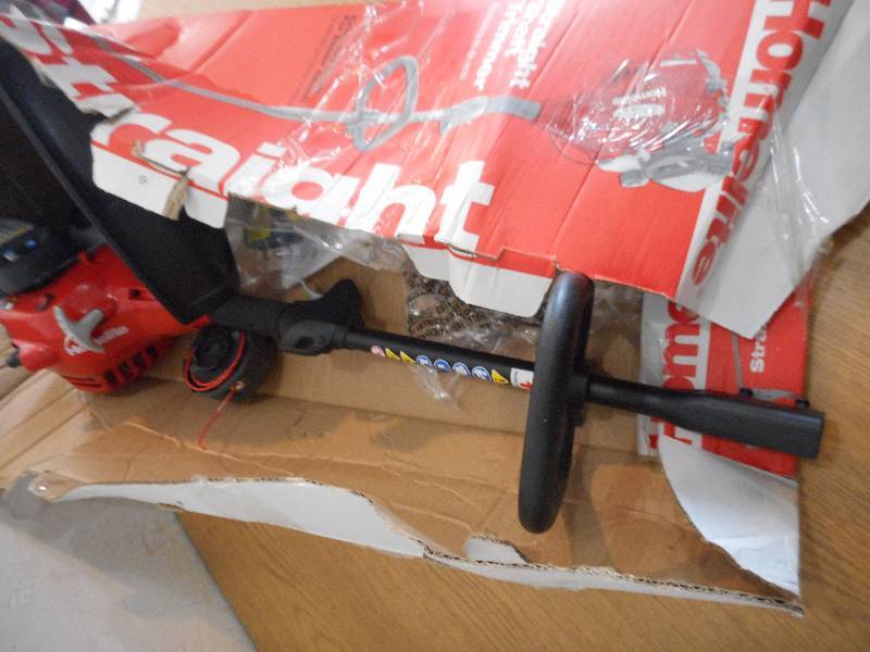 lot 35 image: Homelite 2-Cycle 26cc Straight Shaft Gas Trimmer