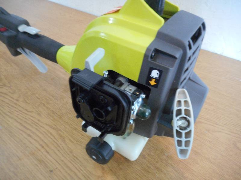 lot 39 image: Ryobi 2-Cycle 25cc Gas Full Crank Straight Shaft String Trimmer