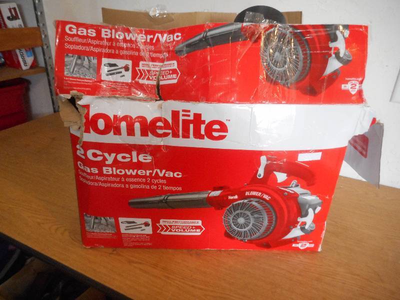 lot 67 image: Homelite 150 MPH 400 CFM 26cc Gas Handheld Blower Vacuum